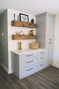 A kitchen cupboard set with tall storage