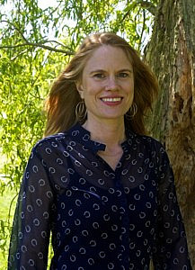 Headshot of Claire de Boursac APDO member standing under a tree
